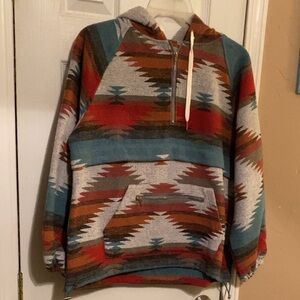 Boutique brand pull over, size small, super cute! Aztec type print.